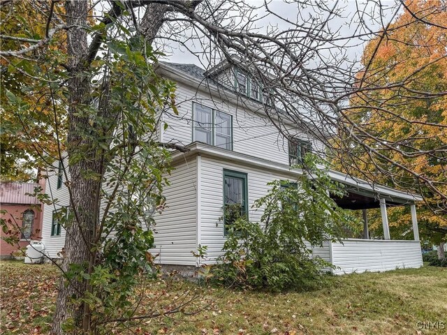 12 Academy St, Antwerp, NY 13608 - view of property exterior with a yard