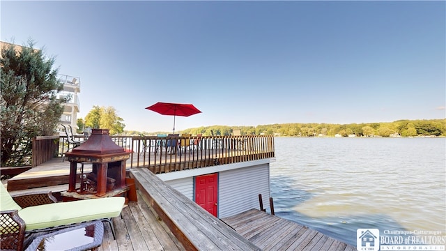 dock area featuring a water view