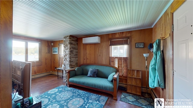 living room featuring hardwood / wood-style floors, wooden walls, a wall mounted AC, and baseboard heating