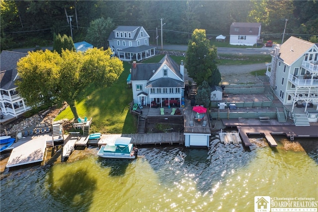 drone / aerial view with a water view