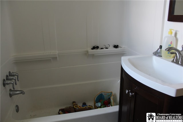 bathroom with vanity with extensive cabinet space