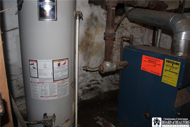 utility room with gas water heater and water heater