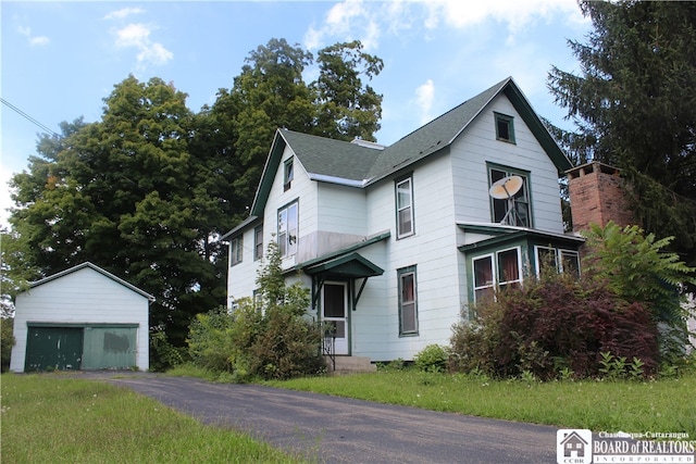 view of property exterior with a garage