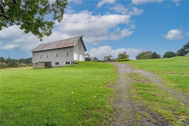 view of yard with a garage