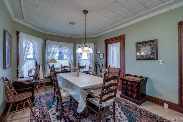 tiled dining area with ornamental molding