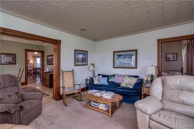 living room featuring light carpet