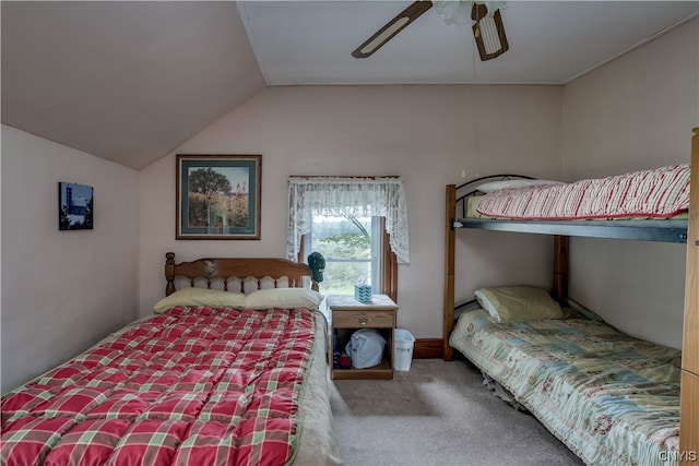 bedroom featuring ceiling fan, light colored carpet, and vaulted ceiling