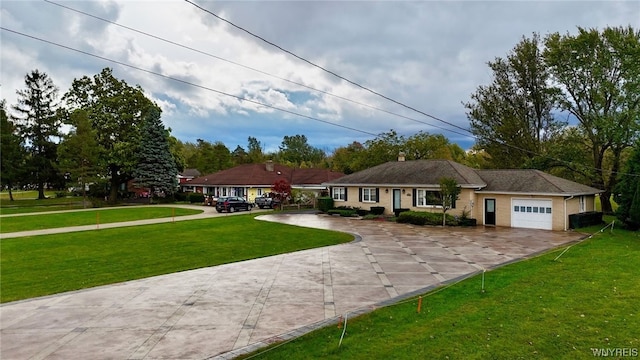 ranch-style house featuring a front lawn and a garage