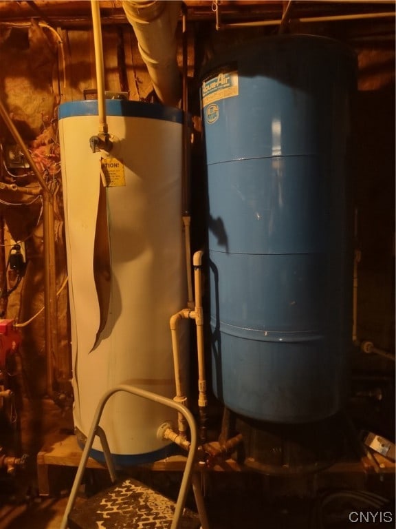 utility room featuring gas water heater