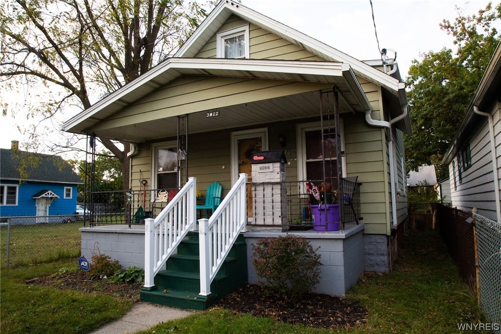 bungalow-style house with covered porch