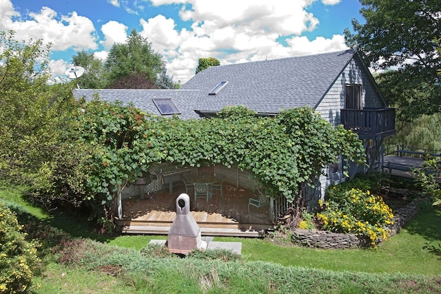 exterior space featuring a wooden deck