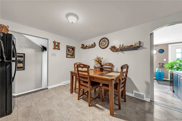 view of tiled dining space