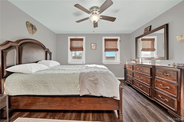 bedroom featuring ceiling fan and dark wood-type flooring