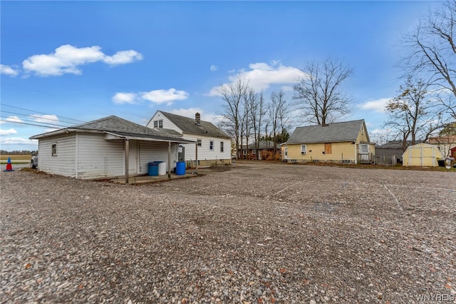 exterior space featuring a storage shed