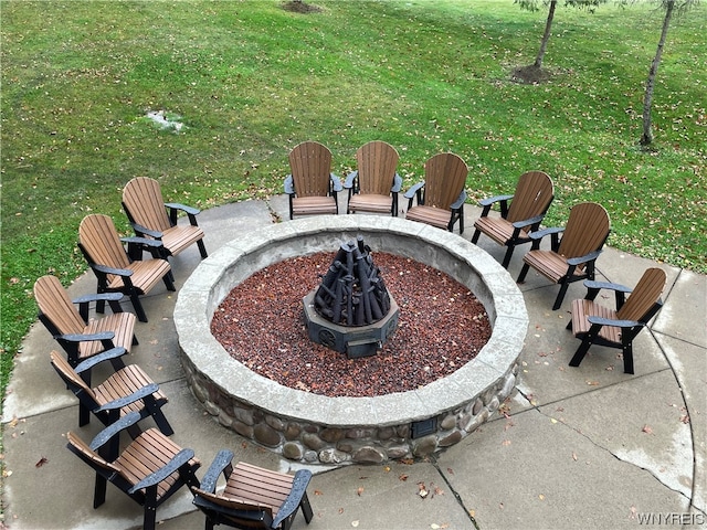 view of yard with a fire pit and a patio area