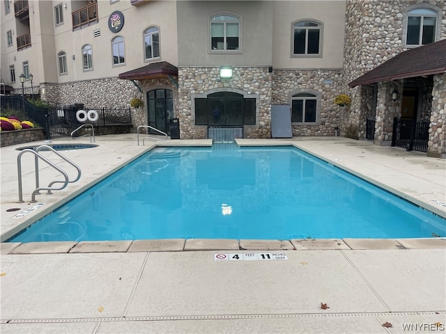 view of pool with a patio