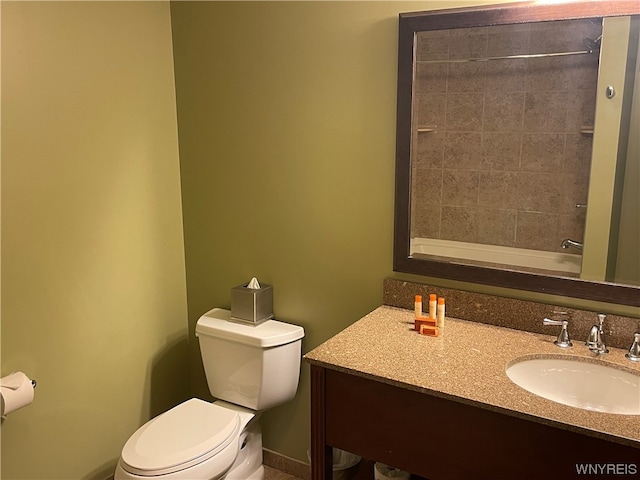 bathroom with toilet and vanity