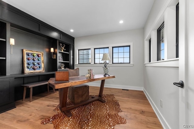 office space featuring light wood-type flooring