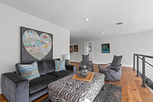 living room with light hardwood / wood-style floors