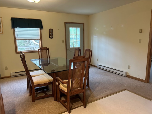 carpeted dining area with a baseboard radiator