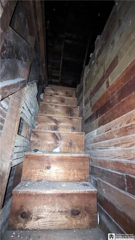 stairs with wooden walls