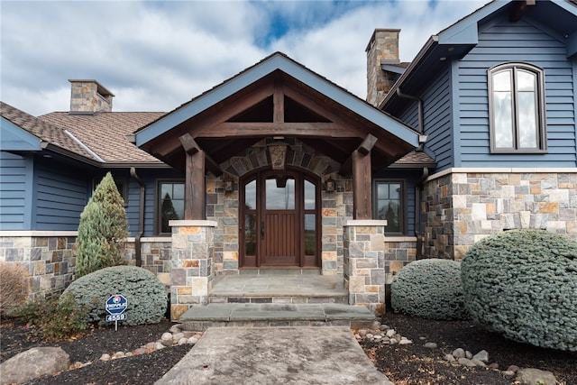 doorway to property featuring a porch