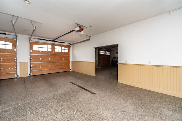 garage featuring a garage door opener