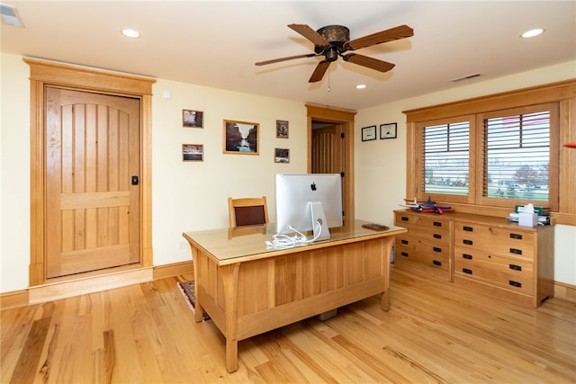 office space with ceiling fan and light hardwood / wood-style floors