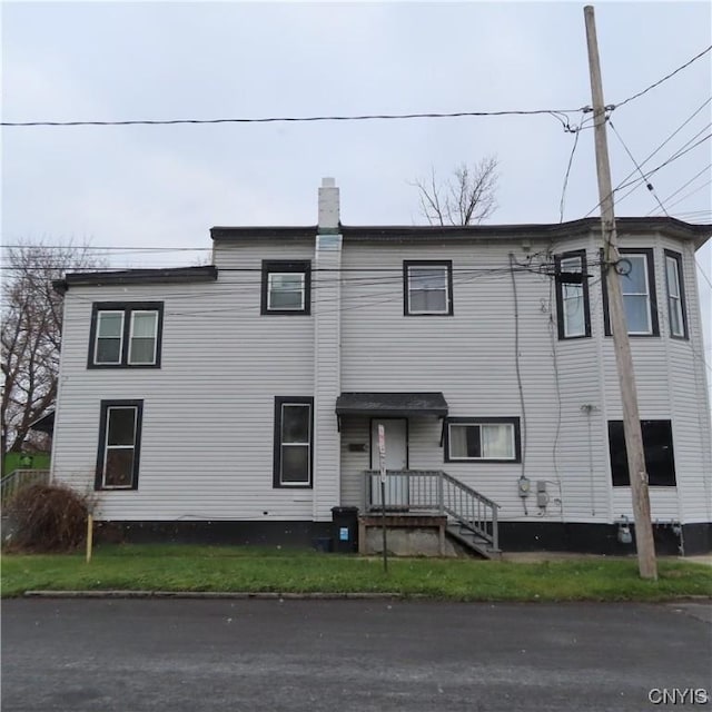 301 E Manlius St, Dewitt, NY 13057 - townhome / multi-family property with a chimney
