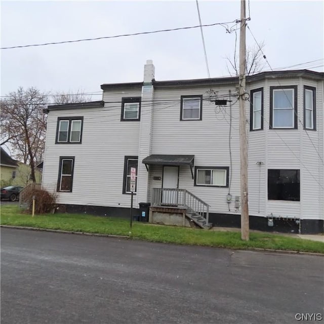 301 E Manlius St, Dewitt, NY 13057 - view of property featuring a chimney