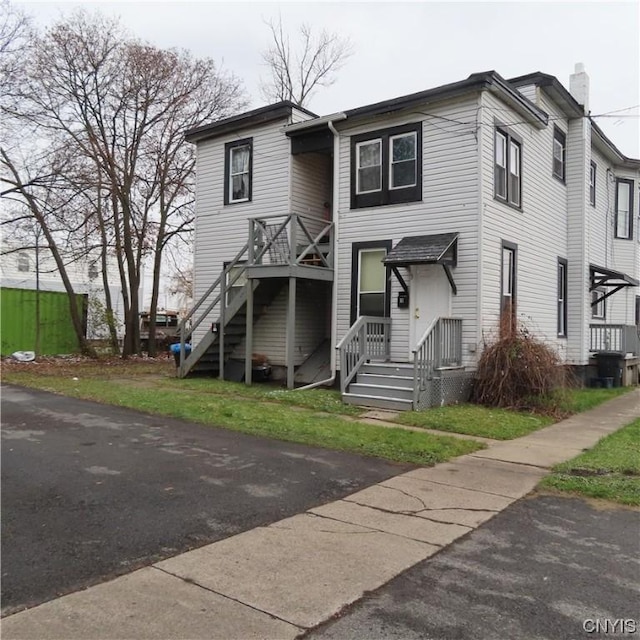 301 E Manlius St, Dewitt, NY 13057 - view of front of property featuring a chimney