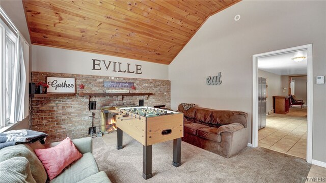 game room with tile patterned flooring, high vaulted ceiling, plenty of natural light, and wood ceiling