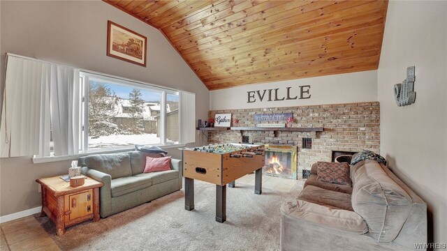 playroom with light colored carpet, wood ceiling, high vaulted ceiling, and a brick fireplace