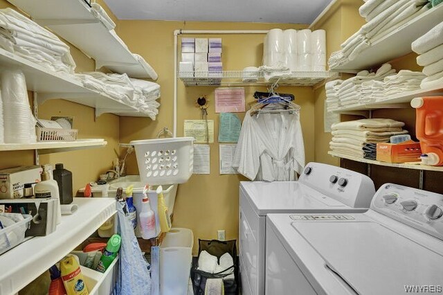 laundry room with washer and dryer