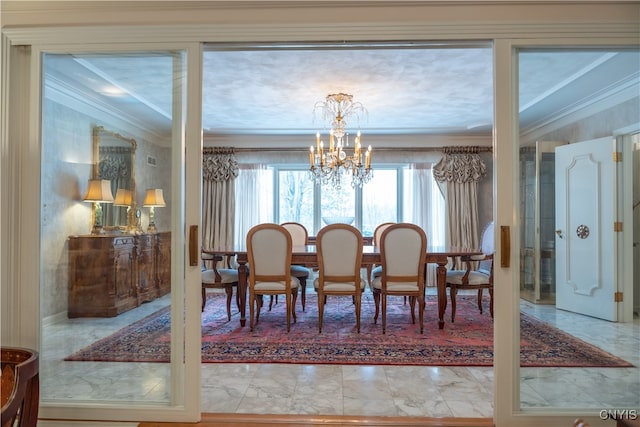 dining room featuring a notable chandelier and ornamental molding