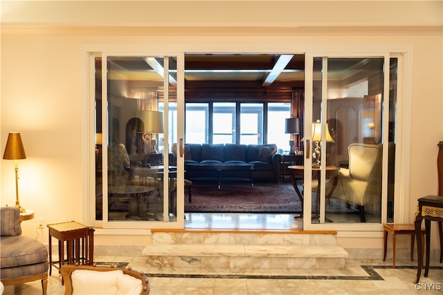 interior space with beam ceiling and crown molding