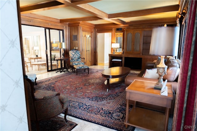 tiled living room with coffered ceiling, wooden walls, and beamed ceiling