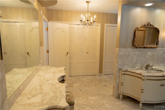 bathroom with an inviting chandelier