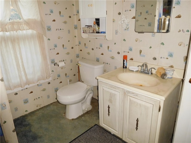 bathroom with vanity and toilet