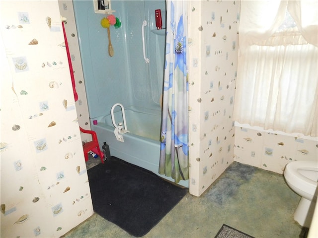 bathroom with toilet and shower / bath combo with shower curtain