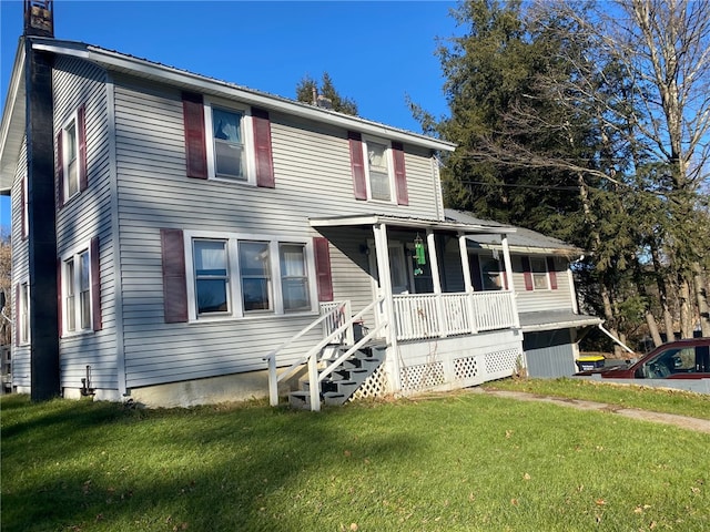 view of front of house featuring a front yard and a porch