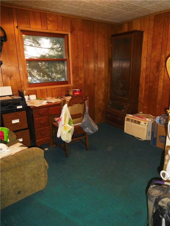 office space with carpet flooring, wood walls, and a wall mounted AC