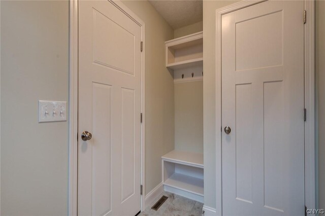 LOT214 Tall Tree Ln, Lysander, NY 13027 - mudroom featuring visible vents and baseboards