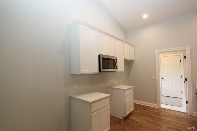 LOT214 Tall Tree Ln, Lysander, NY 13027 - laundry room with baseboards and dark wood-type flooring