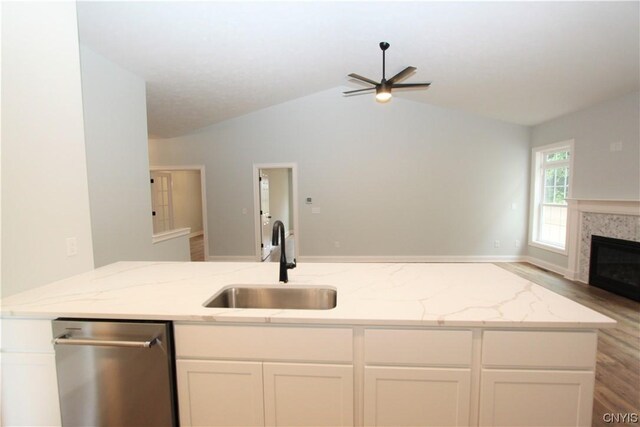 LOT214 Tall Tree Ln, Lysander, NY 13027 - kitchen featuring lofted ceiling, stainless steel dishwasher, a sink, open floor plan, and ceiling fan