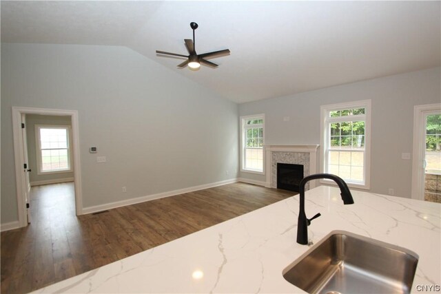 LOT214 Tall Tree Ln, Lysander, NY 13027 - kitchen with vaulted ceiling, wood finished floors, a sink, and ceiling fan