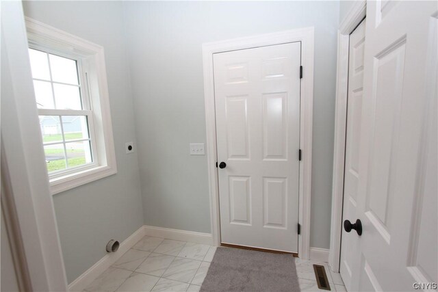 LOT214 Tall Tree Ln, Lysander, NY 13027 - laundry area featuring visible vents, baseboards, marble finish floor, electric dryer hookup, and laundry area