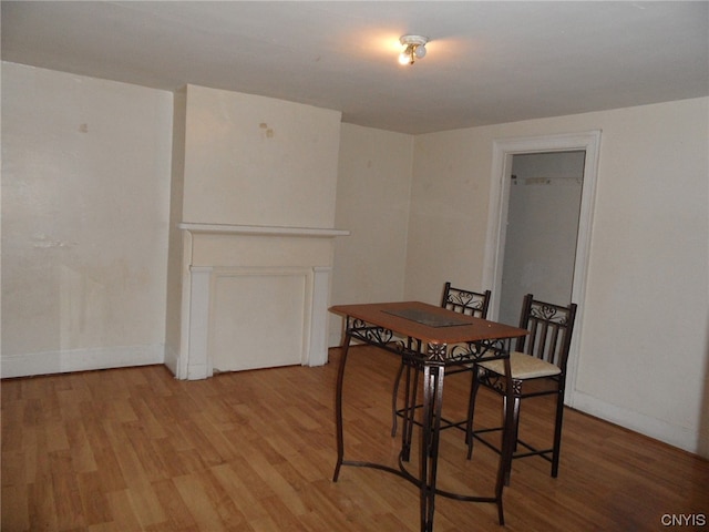 dining area featuring light wood-type flooring