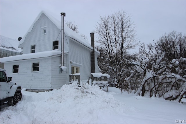 view of snow covered property