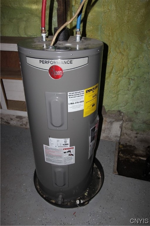 utility room featuring electric water heater